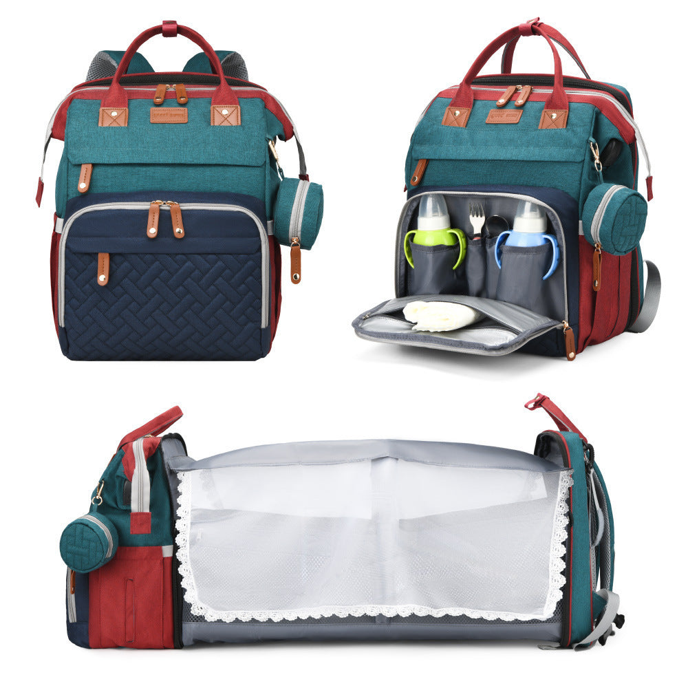Mommy Backpack with Crib – Large capacity diaper bag with foldable crib and anti-mosquito cover.