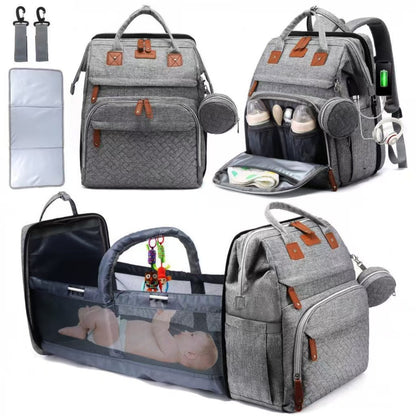 Mommy Backpack with Crib – Large capacity diaper bag featuring foldable crib and anti-mosquito cover.
