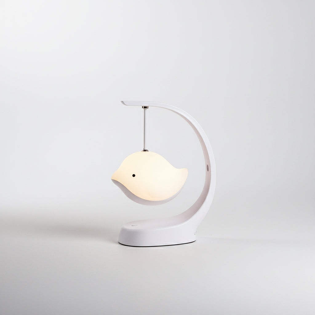 White bird-shaped lamp on a white background